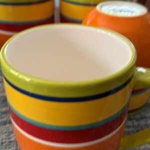 Set of 4 coffee mugs.